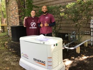 happy customer with new generator installed by Corbin Electrical Services